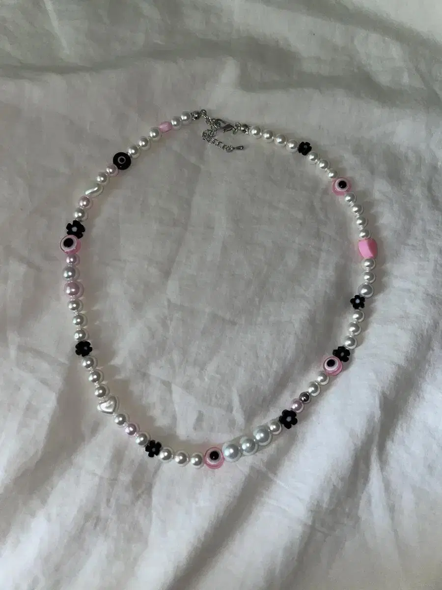 Pink eye necklace